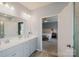 Bathroom with a dual sink vanity next to the bedroom at 2296 Idol Rock Dr, Indian Land, SC 29707
