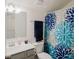 Bright bathroom with floral shower curtain, sink, and vanity at 2296 Idol Rock Dr, Indian Land, SC 29707