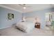 Bedroom with a tray ceiling and cozy decor at 2296 Idol Rock Dr, Indian Land, SC 29707