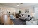 Open living space with modern furnishings, hardwood floors, and access to the kitchen at 2296 Idol Rock Dr, Indian Land, SC 29707