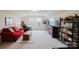 Spacious living room with plush seating, a large window, and built in shelving at 2296 Idol Rock Dr, Indian Land, SC 29707
