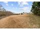 Large backyard and distant home at 24253 Old Aquadale Rd, Albemarle, NC 28001