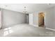 Bright bedroom boasting neutral walls, plush carpet, and doors leading to other rooms at 2525 Surveyor General Dr, Waxhaw, NC 28173