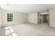 Spacious bedroom features neutral paint and carpeted floor at 2525 Surveyor General Dr, Waxhaw, NC 28173