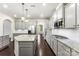 Well-equipped kitchen with granite countertops, stainless steel appliances, and ample cabinet space at 2525 Surveyor General Dr, Waxhaw, NC 28173