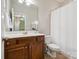 Bathroom featuring a vanity with sink and a shower with a curtain, combining style and functionality at 2545 Chasewater Dr, Fort Mill, SC 29707