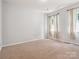 Spacious bedroom with neutral carpet, ample natural light, and ample space at 2545 Chasewater Dr, Fort Mill, SC 29707