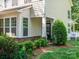 Charming home exterior with stone accents, lush landscaping, and inviting entryway at 2545 Chasewater Dr, Fort Mill, SC 29707