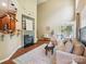 Inviting living room with hardwood floors, a cozy fireplace, and sliding glass doors to an outdoor space at 2545 Chasewater Dr, Fort Mill, SC 29707