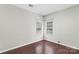Bedroom showcasing natural light, hardwood floors, neutral paint, and window with blinds at 3212 Ashwell Oaks Ln, Matthews, NC 28105