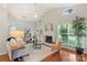 Bright living room features vaulted ceilings, hardwood floors, and a cozy fireplace at 3212 Ashwell Oaks Ln, Matthews, NC 28105