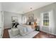 Bedroom featuring hardwood floors, natural light, and neutral colors at 3212 Ashwell Oaks Ln, Matthews, NC 28105
