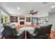 Spacious living room featuring a cozy fireplace, custom built-ins, and hardwood floors at 327 Johnson Dairy Rd, Mooresville, NC 28115
