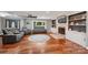 Bright living room featuring a fireplace with built-in shelving and sleek, comfortable seating at 327 Johnson Dairy Rd, Mooresville, NC 28115
