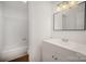 Clean bathroom featuring a vanity with storage and a shower-tub combination at 3427 Wonderland Dr, Matthews, NC 28104