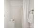 A simple, well-lit shower features built-in seating and neutral tones for a clean and relaxing feel at 3427 Wonderland Dr, Matthews, NC 28104