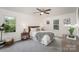 Serene bedroom with ample natural light, providing a calming atmosphere perfect for relaxation and rest at 3427 Wonderland Dr, Matthews, NC 28104