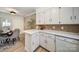 A well-lit kitchen with an adjoining dining area showcases an inviting and functional living space at 3427 Wonderland Dr, Matthews, NC 28104