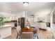 Open kitchen and dining area with bright cabinets, stainless steel appliances, and modern decor at 3427 Wonderland Dr, Matthews, NC 28104