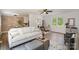 Inviting living room with lots of seating, hardwood floors, and view of kitchen and dining area at 3427 Wonderland Dr, Matthews, NC 28104