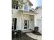 Inviting front entrance with a glass door, stylish sidelights, and classic white trim details at 3617 Betterton Ln, Charlotte, NC 28269