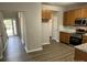 The bright kitchen connects seamlessly to the dining and entrance area, creating an open atmosphere at 3617 Betterton Ln, Charlotte, NC 28269