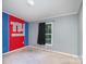 Bedroom with carpet and a window at 394 Link Dr, Iron Station, NC 28080