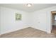 Bedroom featuring wood-look floors and a window view at 402 Gibson Park Dr, Huntersville, NC 28078