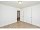Bedroom with wood-look floors and a view into the hallway at 402 Gibson Park Dr, Huntersville, NC 28078