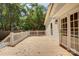 Back deck with white railings, showcasing access to backyard and home entrance at 4226 Raney Way, Charlotte, NC 28205