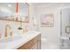 Bathroom with double sinks, updated fixtures and a tiled shower at 4226 Raney Way, Charlotte, NC 28205