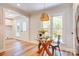 Cozy breakfast nook featuring a glass table, natural light, and backyard view at 4226 Raney Way, Charlotte, NC 28205