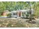 Charming home with a welcoming front porch and well-maintained landscaping at 4226 Raney Way, Charlotte, NC 28205