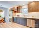 Well-lit kitchen featuring stainless steel appliances, stone countertops and ample cabinet space at 4226 Raney Way, Charlotte, NC 28205