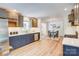Open concept kitchen with modern appliances, granite countertops, and seamless dining area at 4226 Raney Way, Charlotte, NC 28205