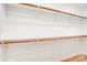 A walk-in closet, with hardwood floors and simple shelving at 4226 Raney Way, Charlotte, NC 28205