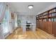 Spacious home office featuring built-in bookshelves and plenty of natural light at 4831 Antioch Church Rd, Matthews, NC 28104