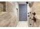 Detailed close-up of the luxurious walk-in shower with multiple shower heads and tiled walls at 4831 Antioch Church Rd, Matthews, NC 28104
