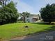 Charming home with well-maintained lawn and beautiful trees at 500 Steel Bridge Loop, Hickory, NC 28601