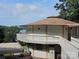 Charming home with unique architecture, featuring a wraparound balcony and water views at 500 Steel Bridge Loop, Hickory, NC 28601