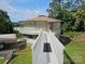 Attractive home featuring a long ramp and a unique architecture overlooking the lush yard at 500 Steel Bridge Loop, Hickory, NC 28601