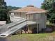 Attractive home featuring multiple decks, unique architecture, and a lush yard at 500 Steel Bridge Loop, Hickory, NC 28601