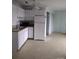 Kitchen with white cabinets, refrigerator, and double sink at 500 Steel Bridge Loop, Hickory, NC 28601