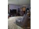 Cozy living room featuring comfortable seating and a large television at 500 Steel Bridge Loop, Hickory, NC 28601