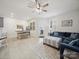 Inviting living room featuring stylish furniture, wood floors, and bright, natural light at 7032 Everly Commons Ln, Tega Cay, SC 29708