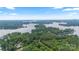 Panoramic aerial view of lakes, forests, and surrounding landscape; idyllic waterfront community at 704 Kenway Loop, Mooresville, NC 28117