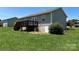 This home includes a cozy deck and large green backyard perfect for entertaining at 72 Helens Way, Taylorsville, NC 28681