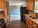 A view of the kitchen with granite countertops and modern appliances at 72 Helens Way, Taylorsville, NC 28681