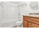 Clean bathroom with white fixtures, tiled flooring, and shower-tub combo at 8062 Knights Bridge Rd, Charlotte, NC 28210