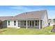 Picture of the backyard featuring a screened porch perfect for enjoying the outdoors in comfort at 1074 Wylie Falls Ln, York, SC 29745